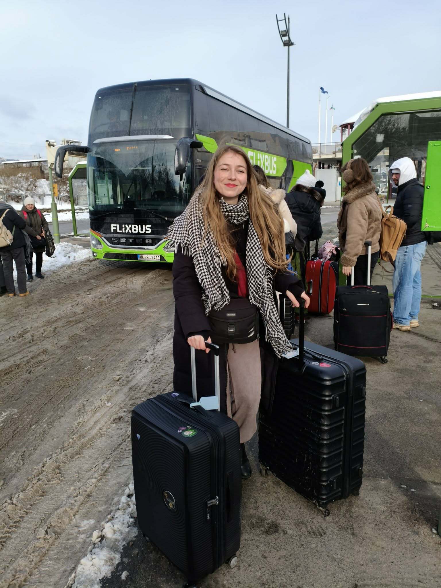 Me with my suitcases in front of the Flixbus