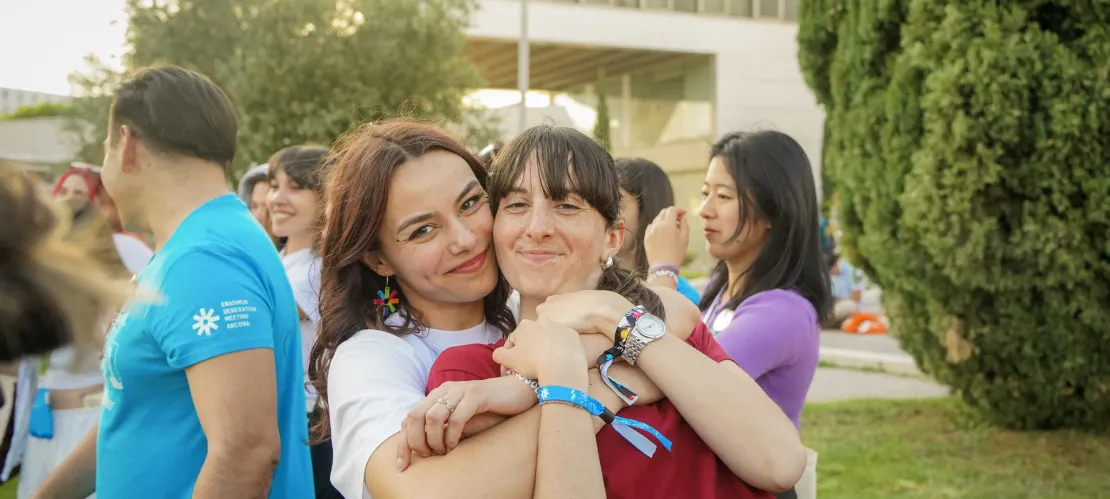 Two friends hugging each other