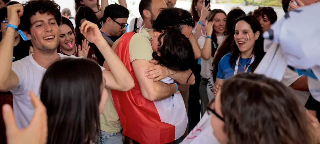 Young people are celebrating EGM Split 2026, hugging