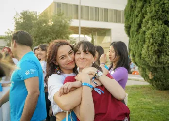 Two friends hugging each other