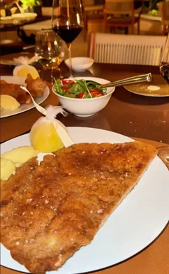 A close up photo of a large Italian breaded cutlet.