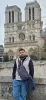 A selfie of me in front of the Notre-Dame Cathedral in Paris.