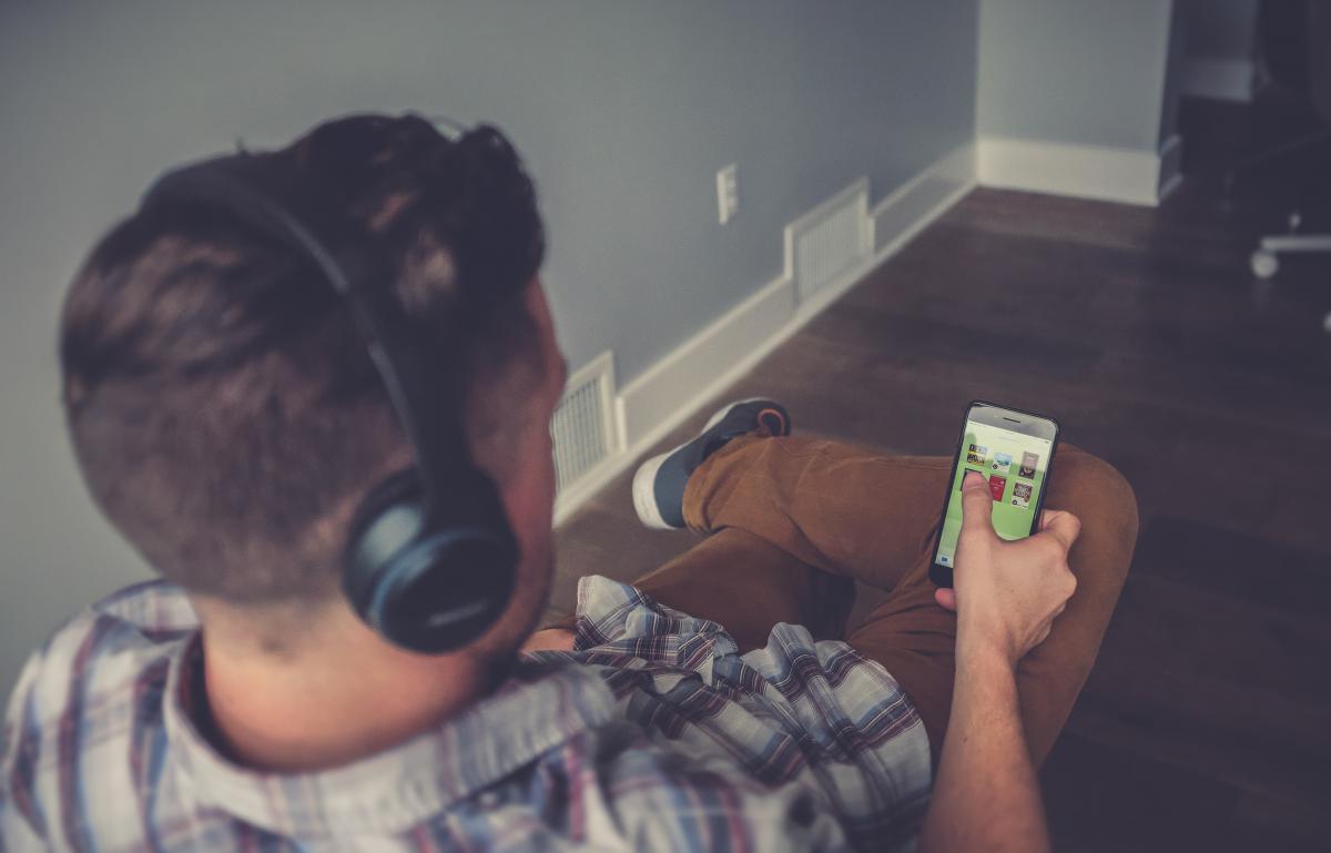 man with headphone listening to music