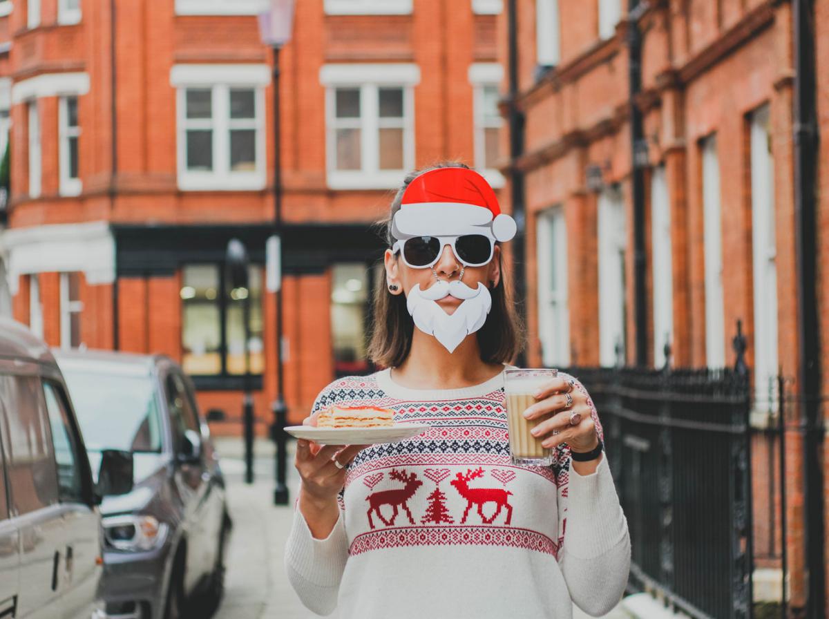 woman wearing a christmas mask