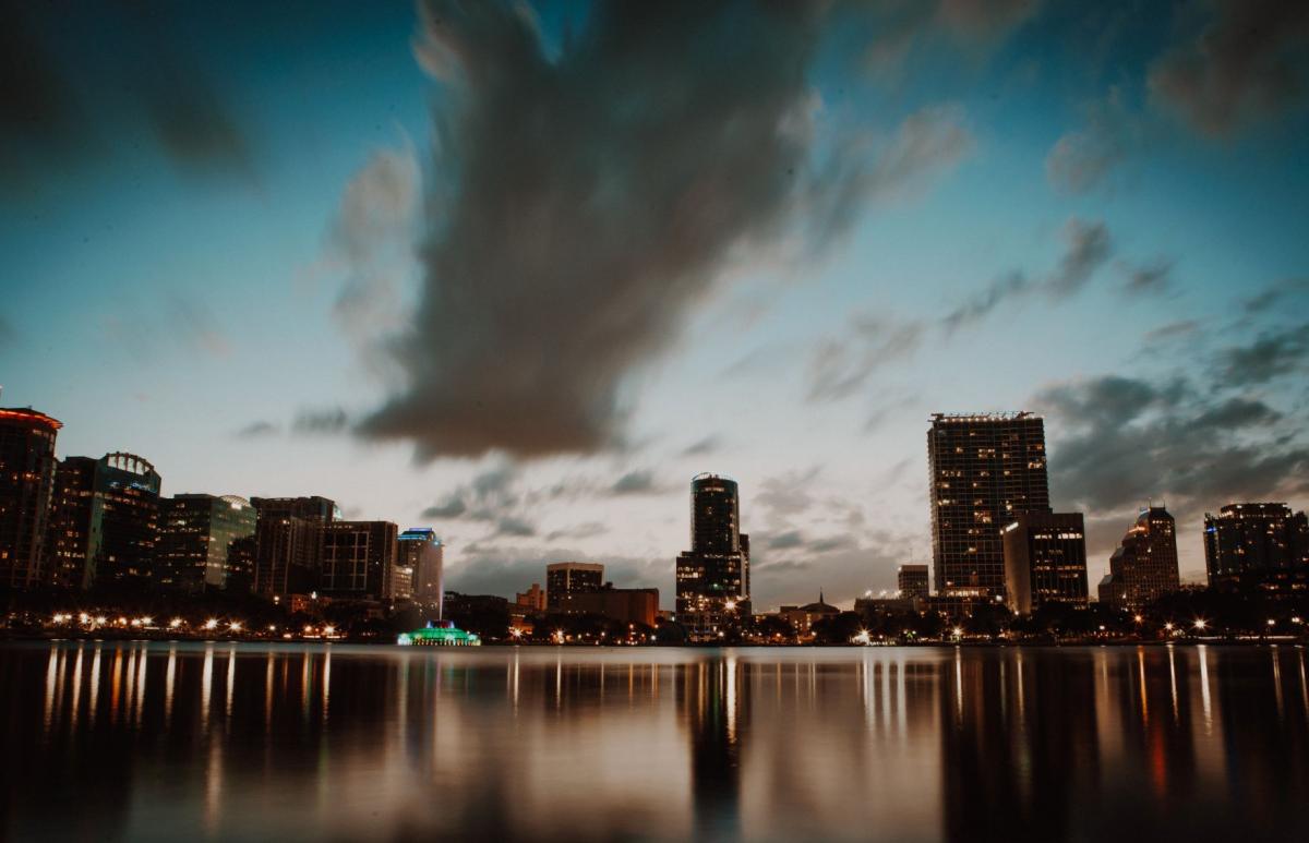 city view with big buildings and clouds in the sky