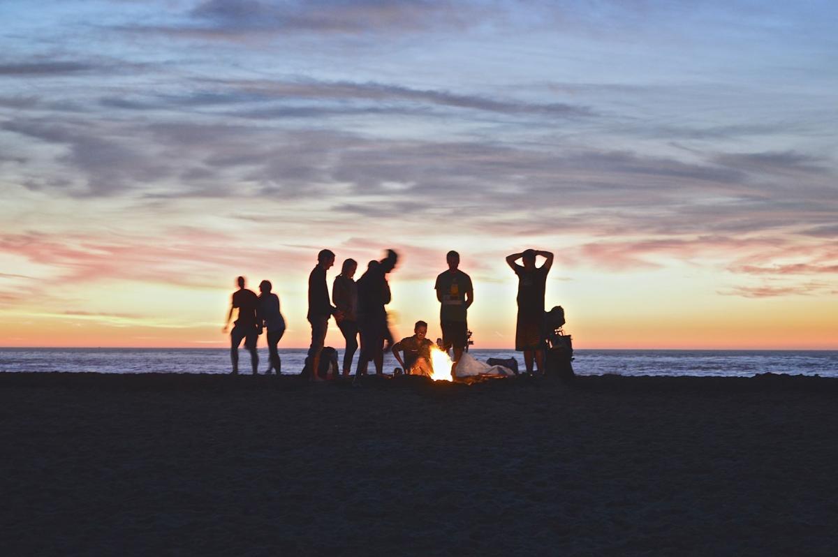 bonfire at beach at sunset