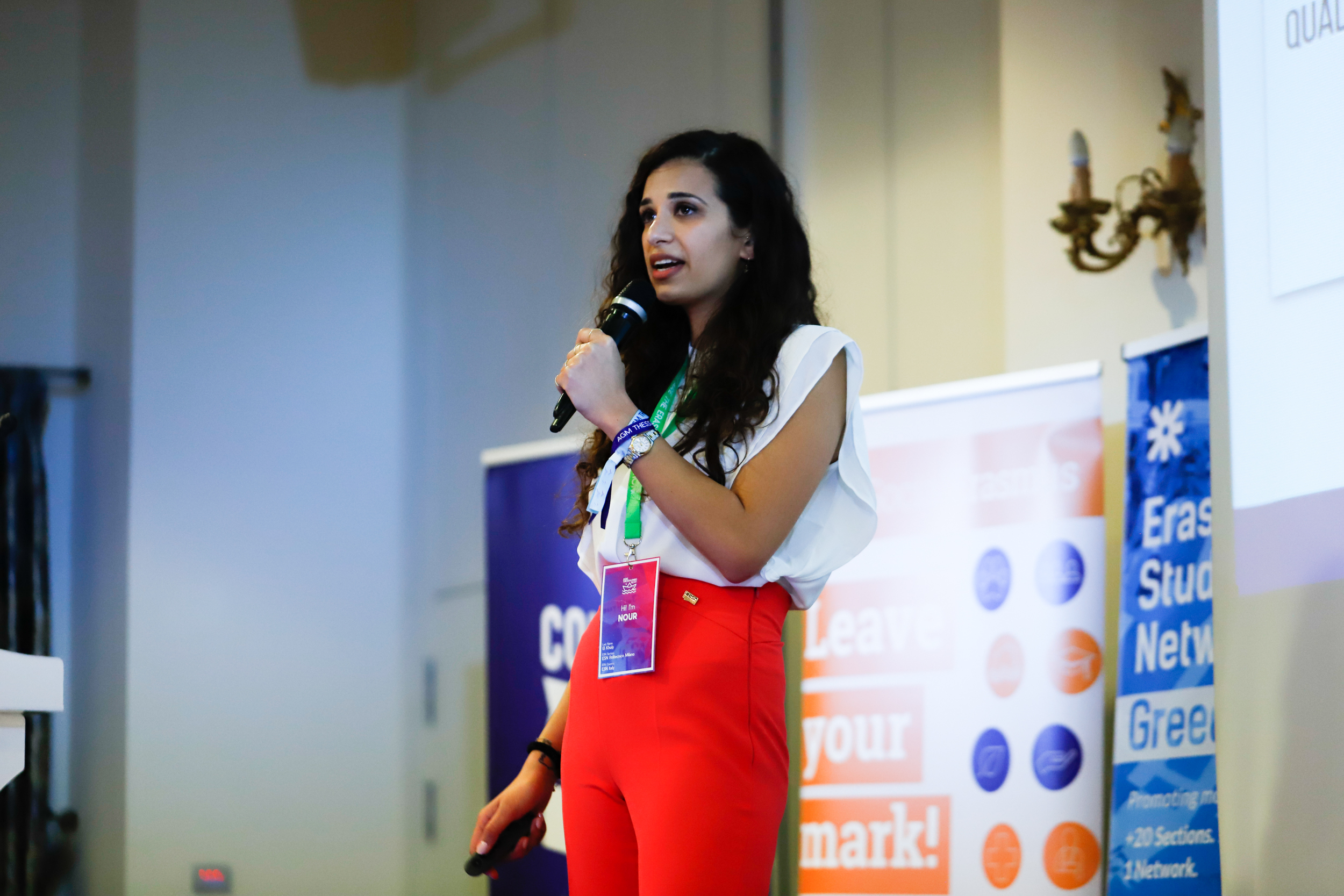 woman talking on stage