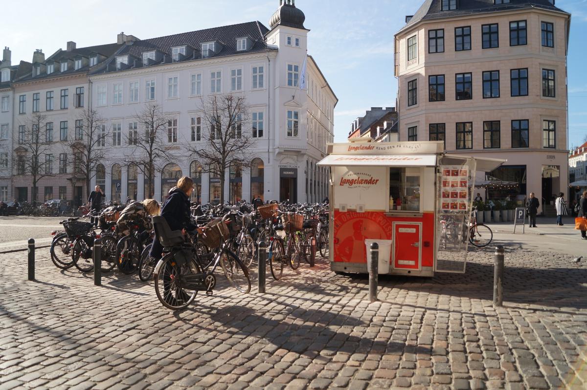 bikes on square with street food stand