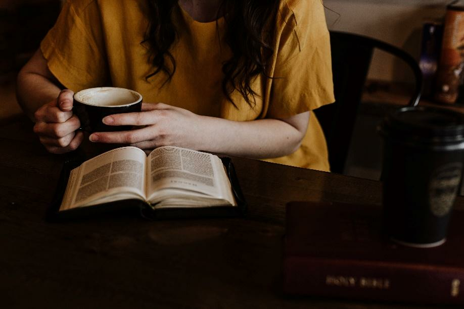 someone reading with coffee