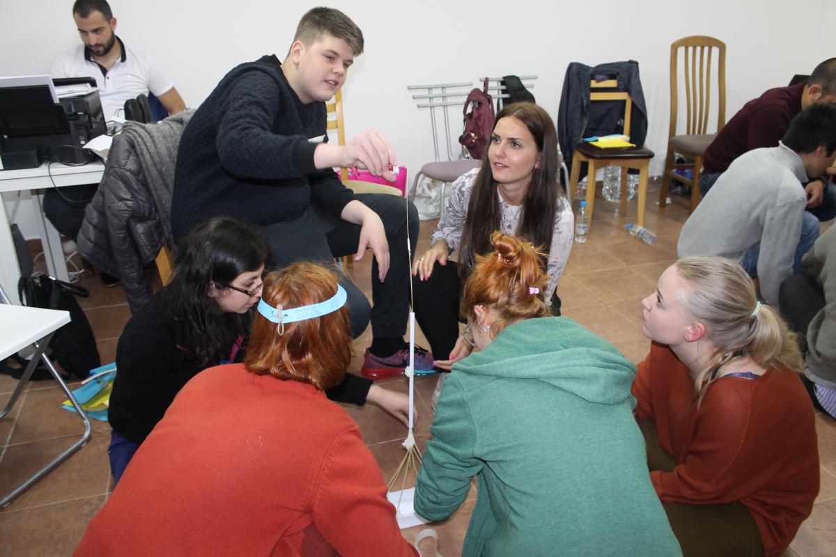 people in circle on the floor