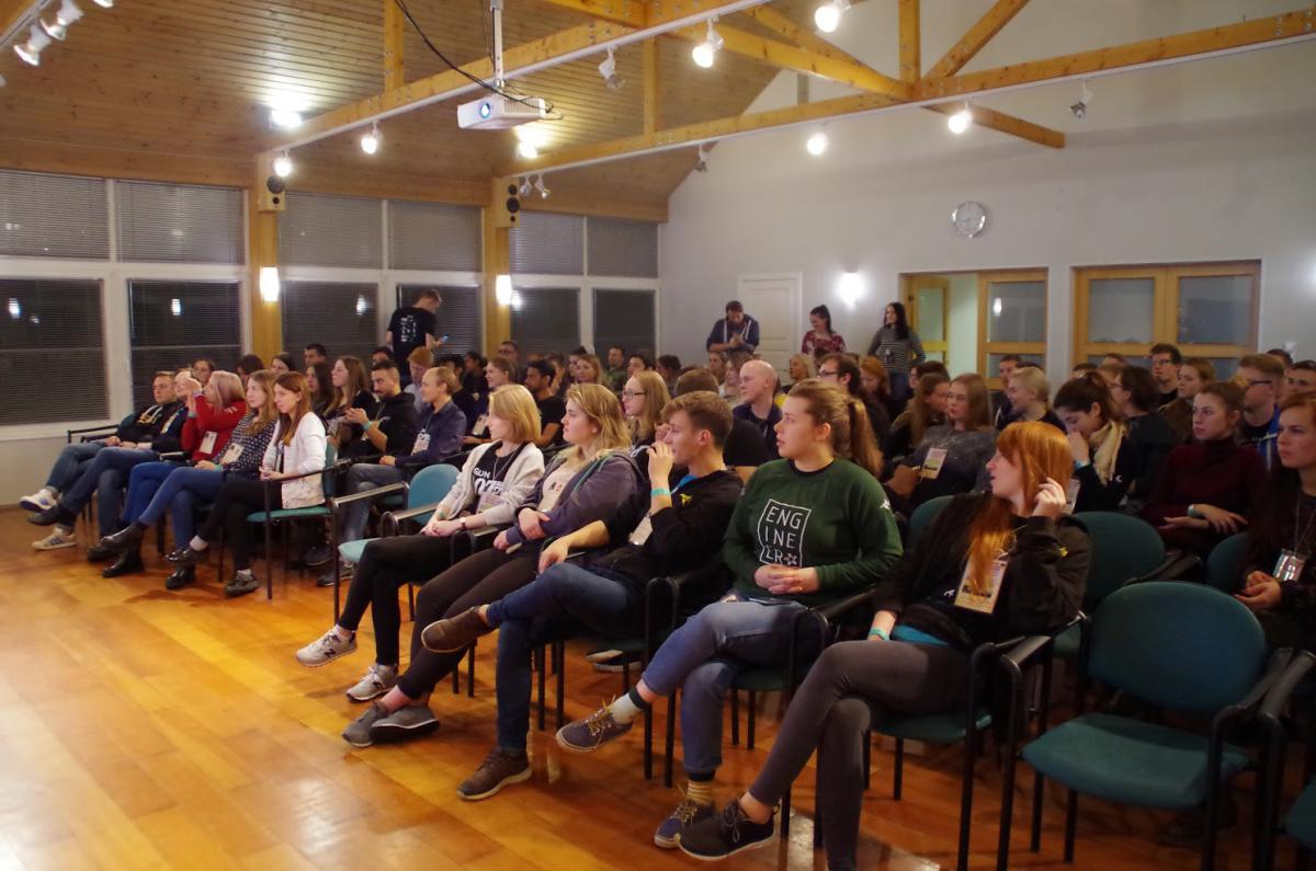 people sit down at event