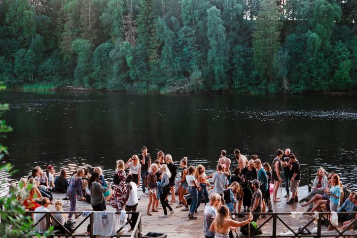 people dancing on beach