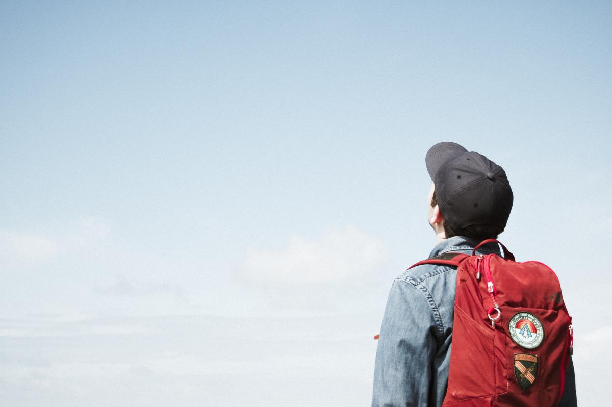 person looking at sky