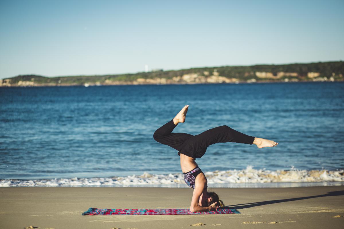 doing yoga at the beach