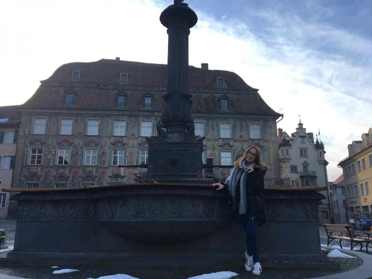 woman next to fountain