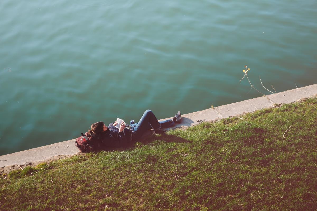 person laying down reading