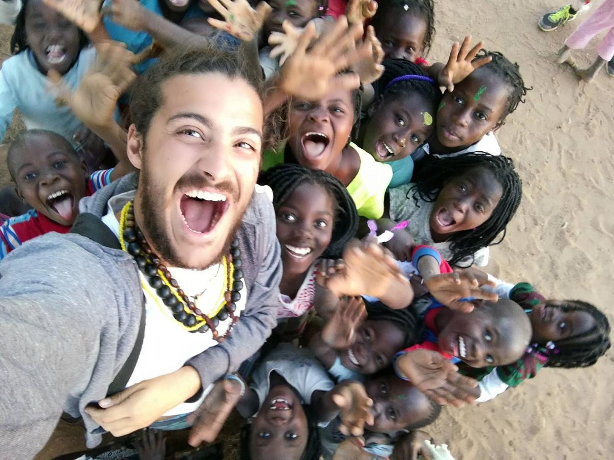 Nicolo with children in Mozambique