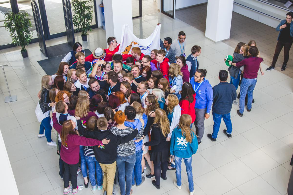 big group of people hugging