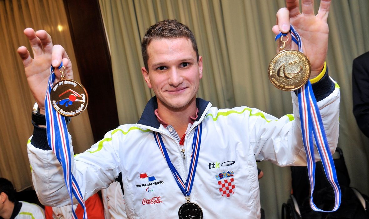 Mihovil Španja with olympic medals