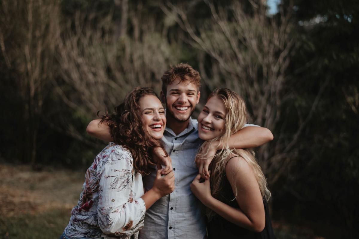 three friends hugging