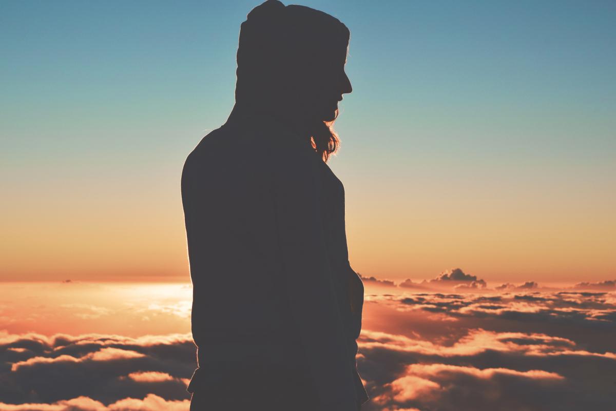 woman above clouds