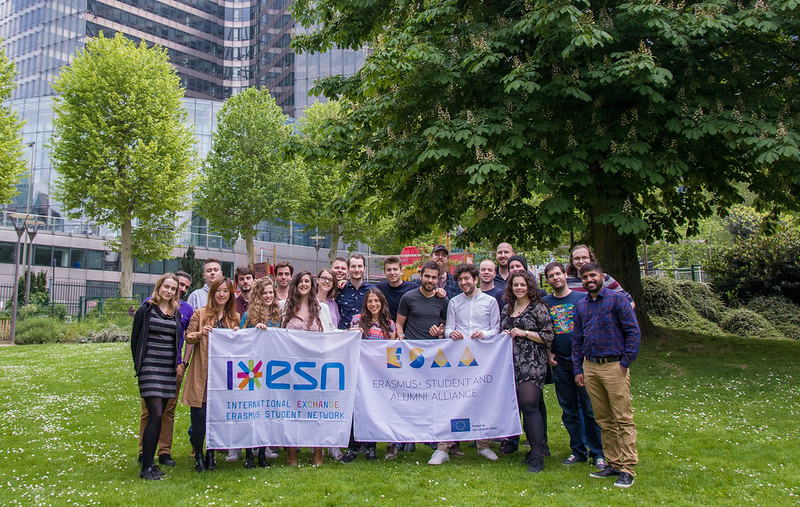 group picture of ESN office with ESN flag
