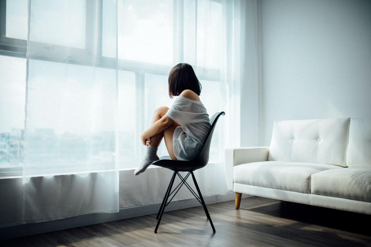 woman sitting on chair