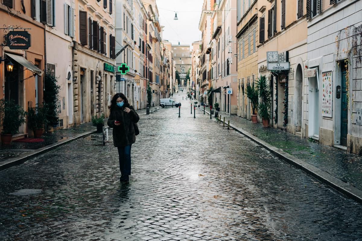 one person walking in street