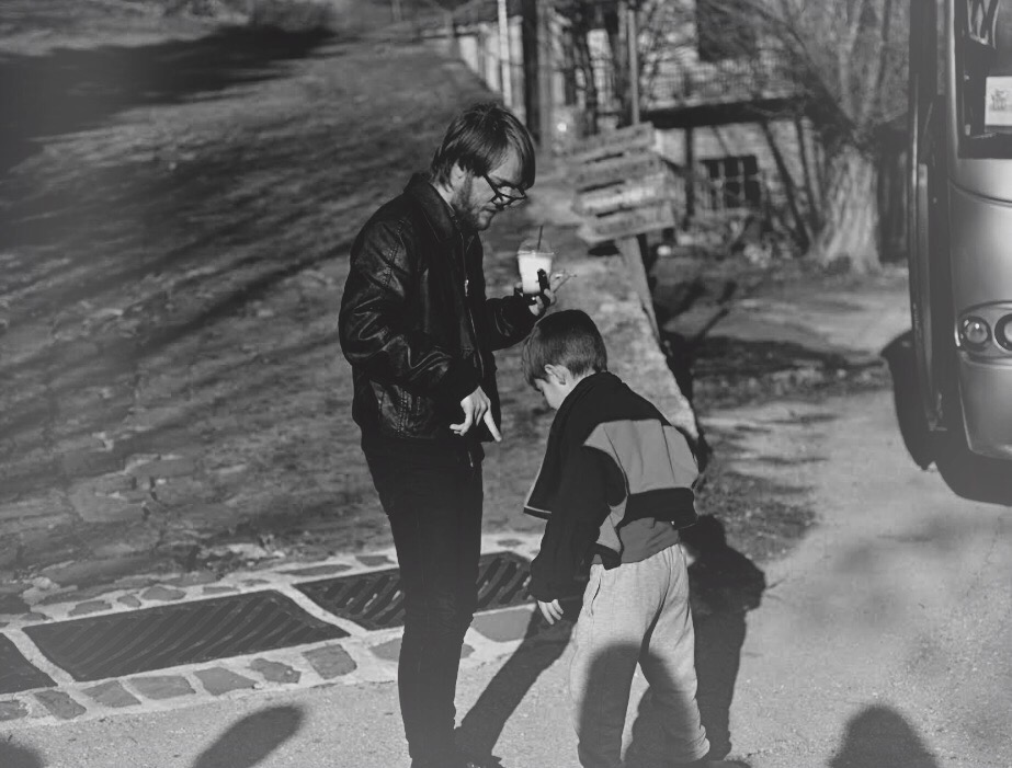 man with icecream with boy