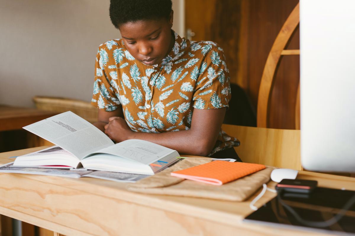 woman reading book