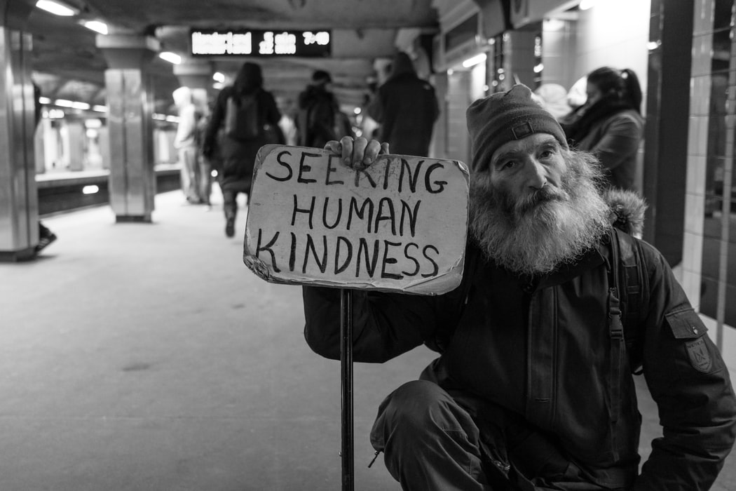 old man with poster