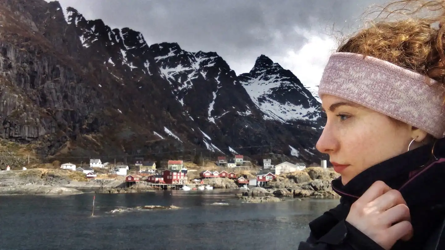 Barbara in Norway, mountains behind her and a lake