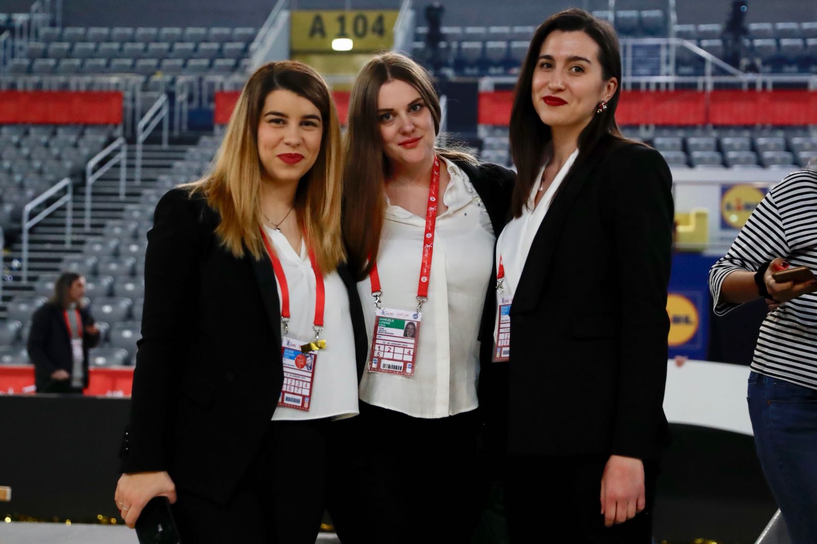 Three women posing for a photo.