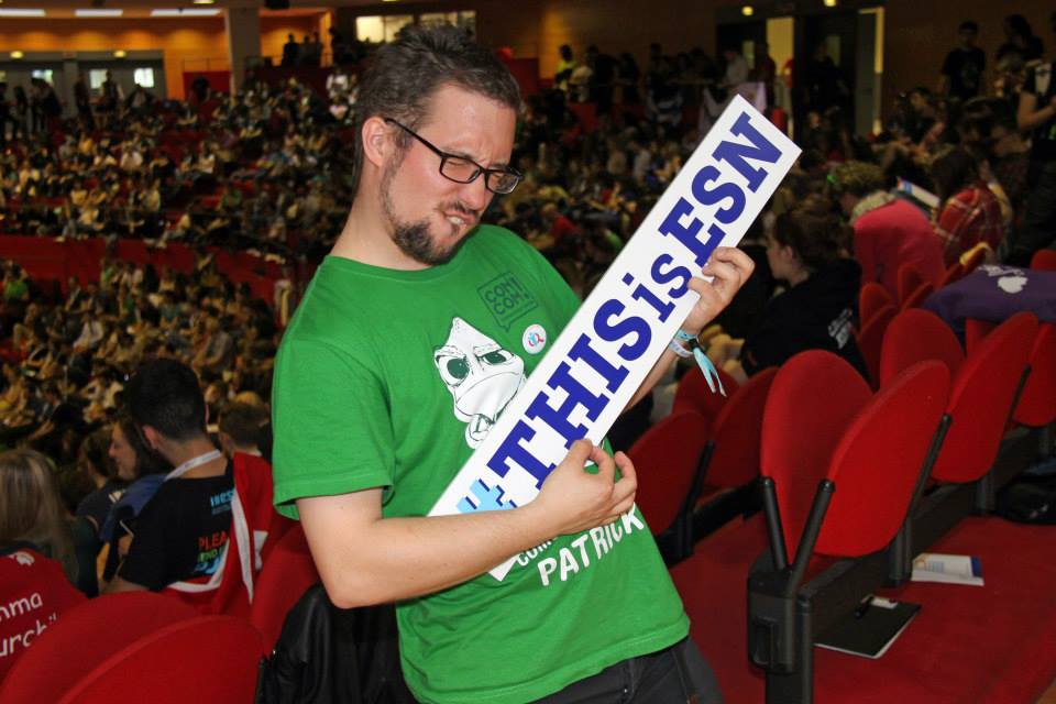 Patrick holding a This is ESN sign