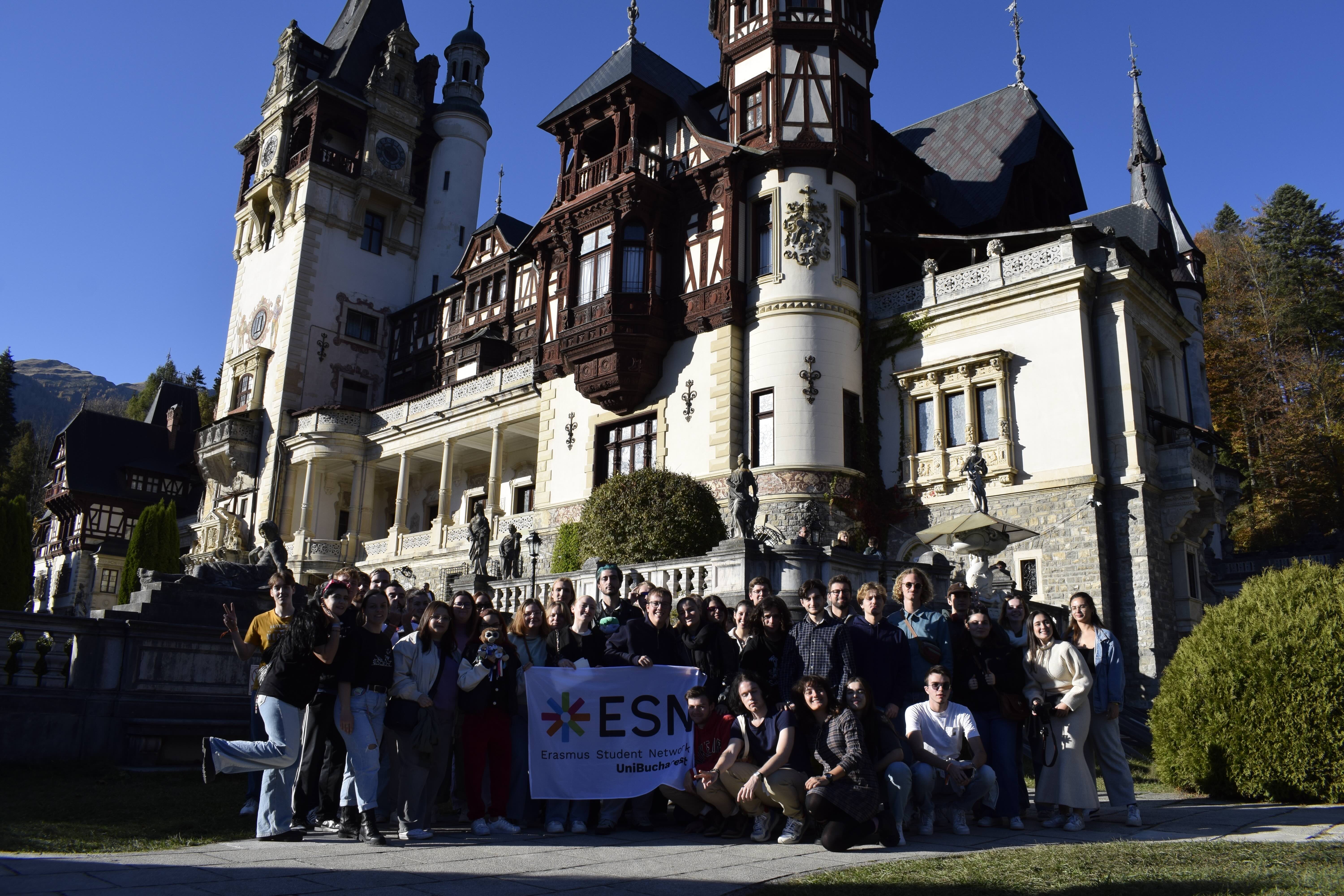 Erasmus people and ESN UniBucharest volunteers in front of Peleș Castle.