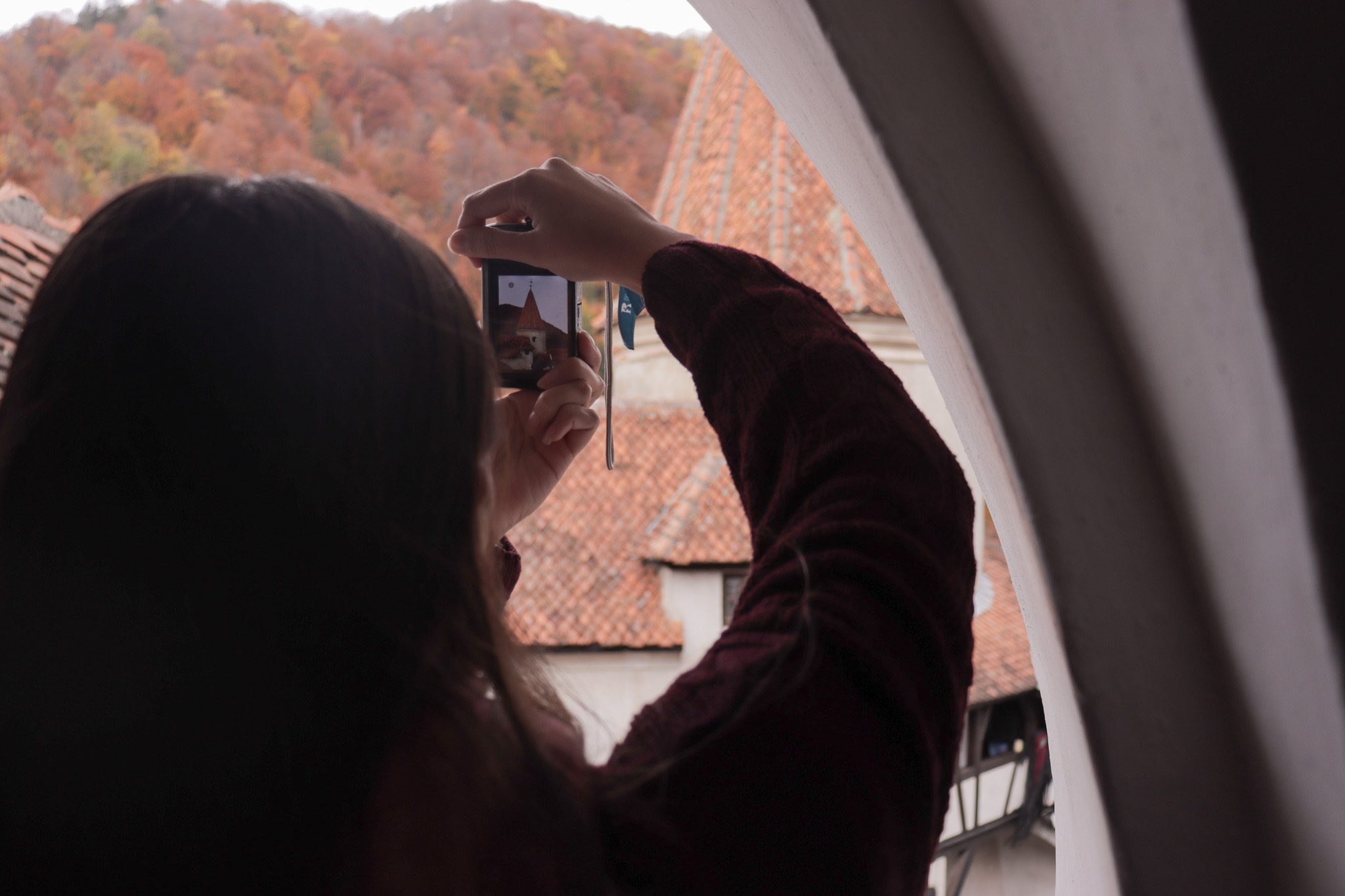 Participant taking a picture of Bran Castle.