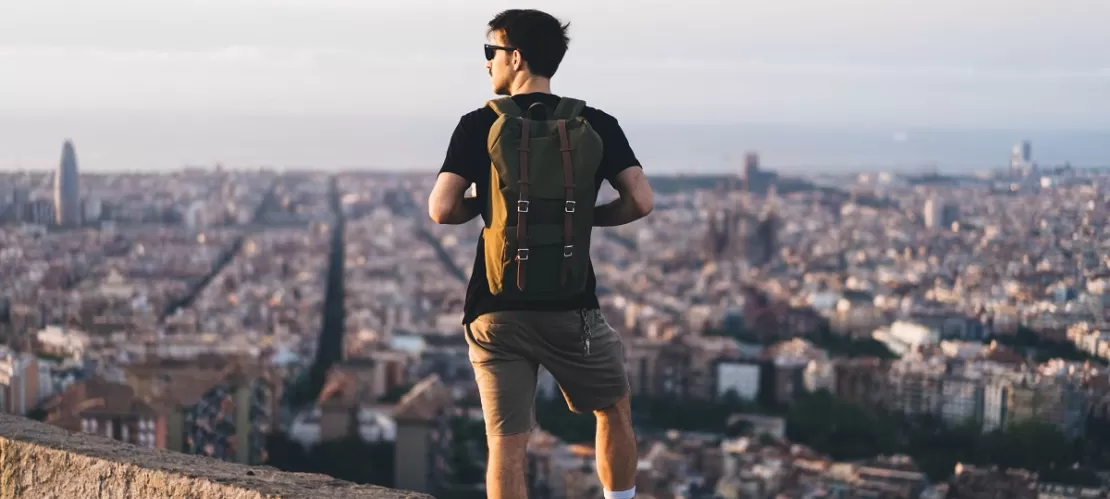 man looking at city from top view