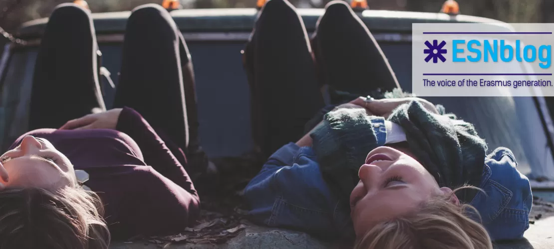 girls over the hood of a car