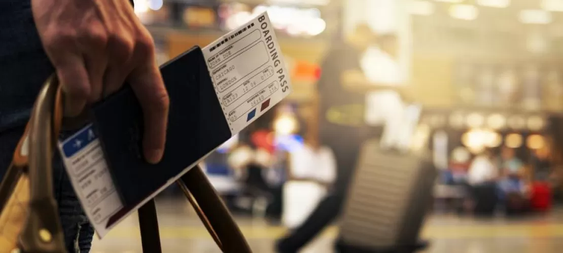 boarding pass in hand