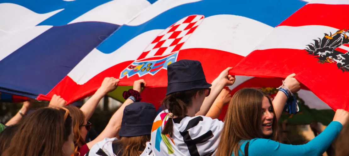 People having a flag