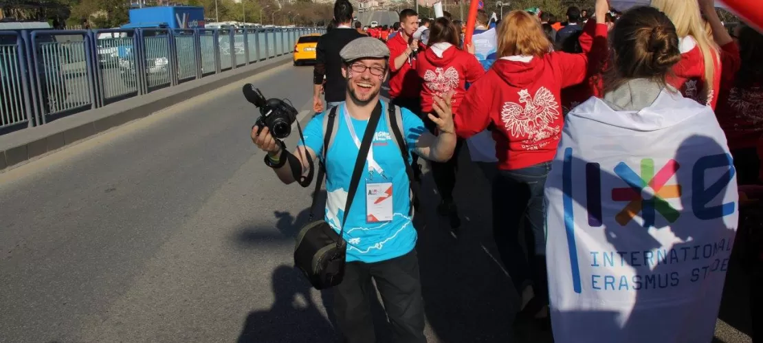 Patrick holding a camera at a ESN event.