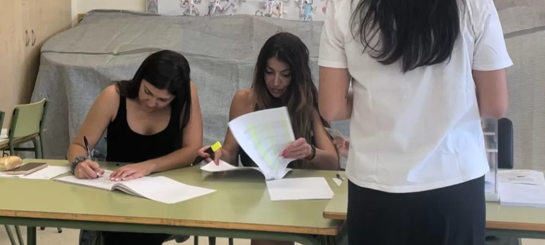 A young girl voting.