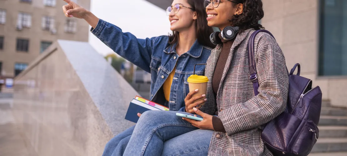 Friends with book having coffee together