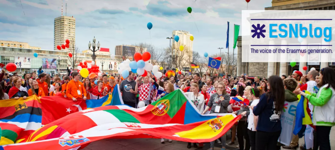 group of people holding a flag