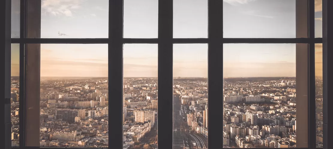 picture of a city through a window