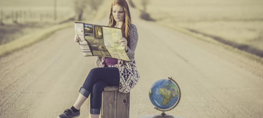 girl reading a map