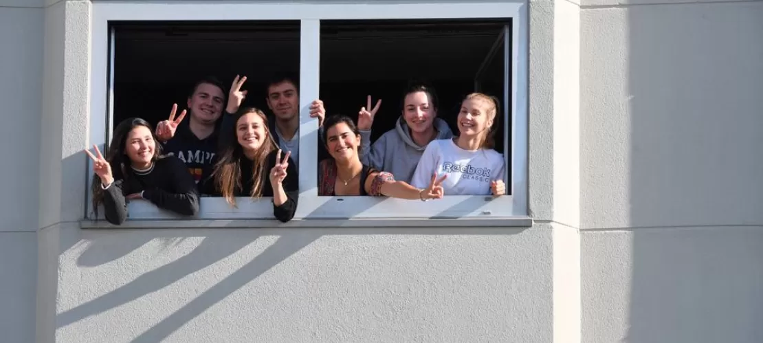 people on a window