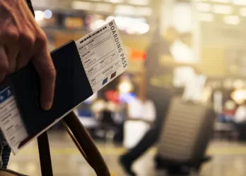 boarding pass in hand