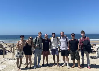 photos of everyone in front of the beach