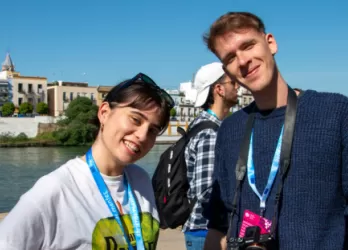 Two people smiling for a photo.